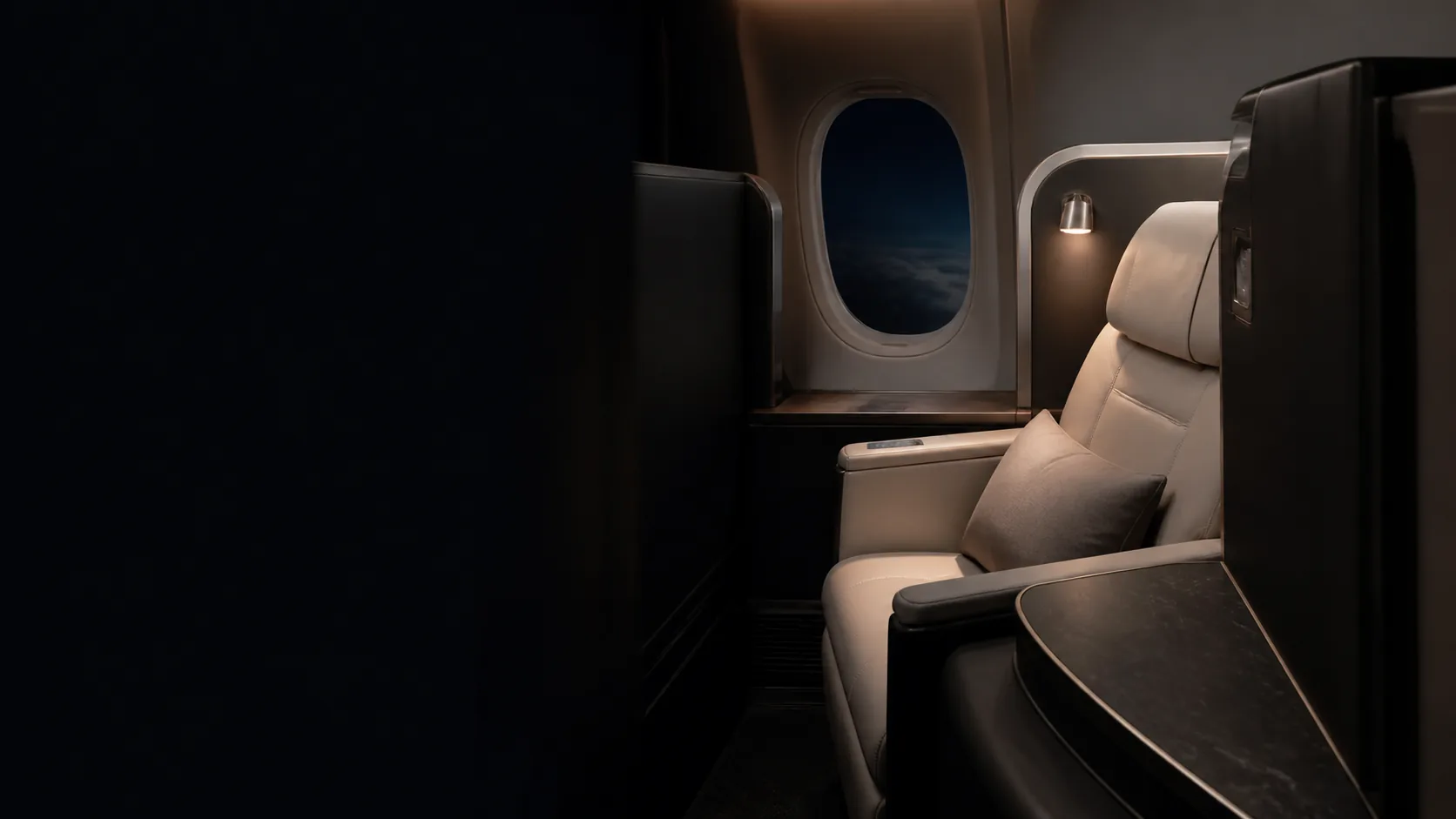 Premium cabin suite beside an aircraft window, shown as travel inspiration